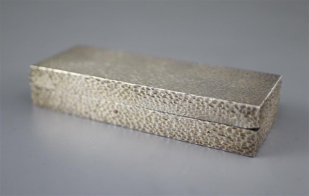 A 1970s textured silver rectangular paint box and brush for Rowney, to commemorate the Queens Silver Jubilee,
